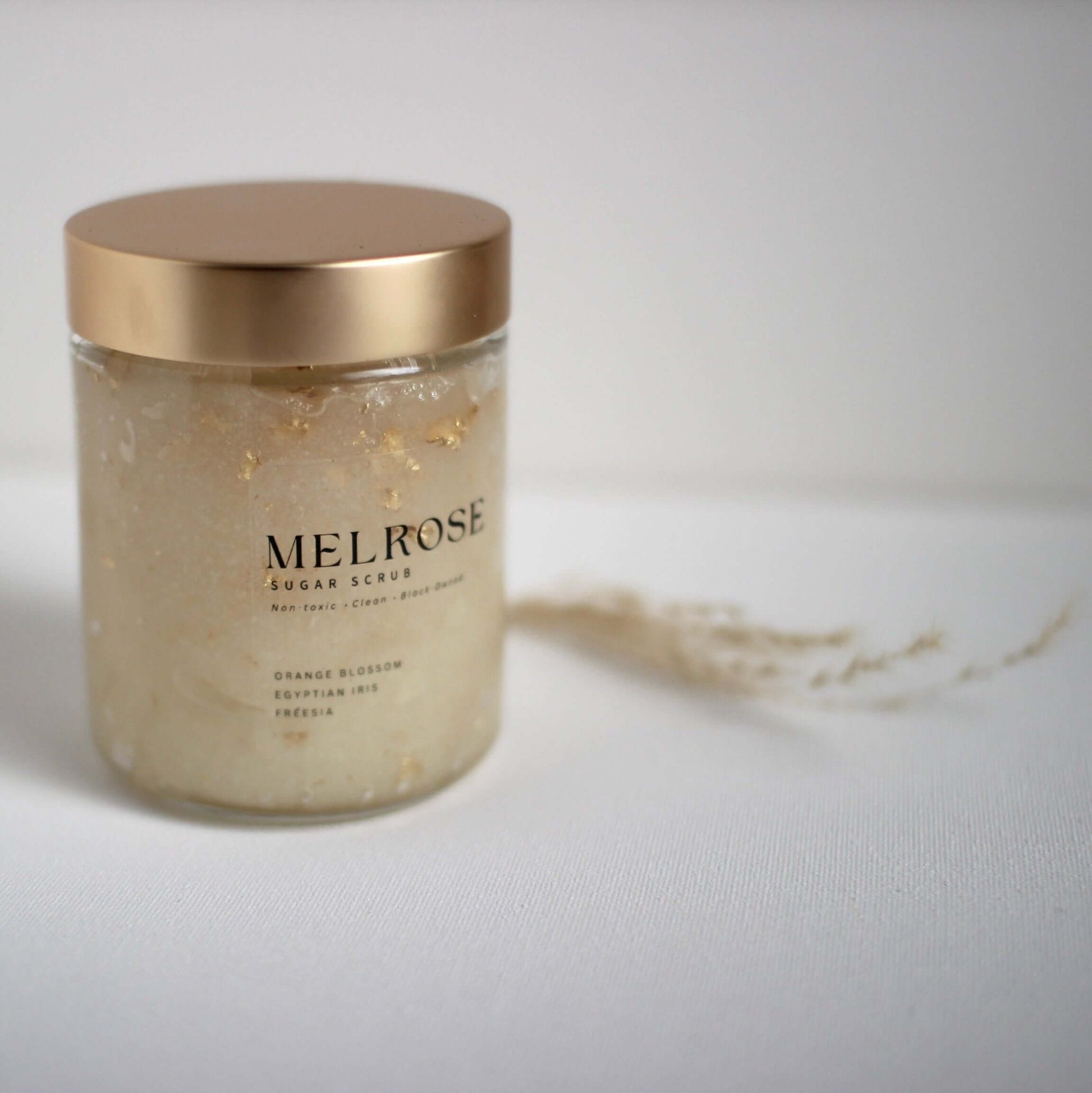 Clean beauty bodycare line for problem skin Licensed esthetician-made skincare for body hyperpigmentation and ingrowns Luxury skincare for body with affordable price tag body cream butters sugar scrub